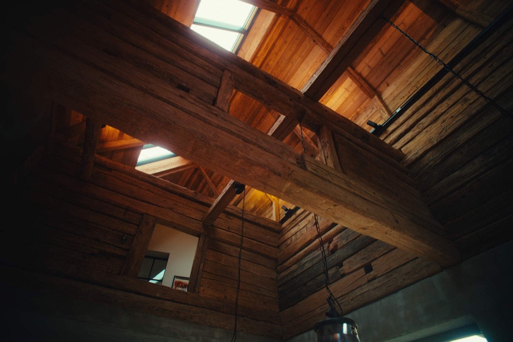 Old timber roof structure with skylights