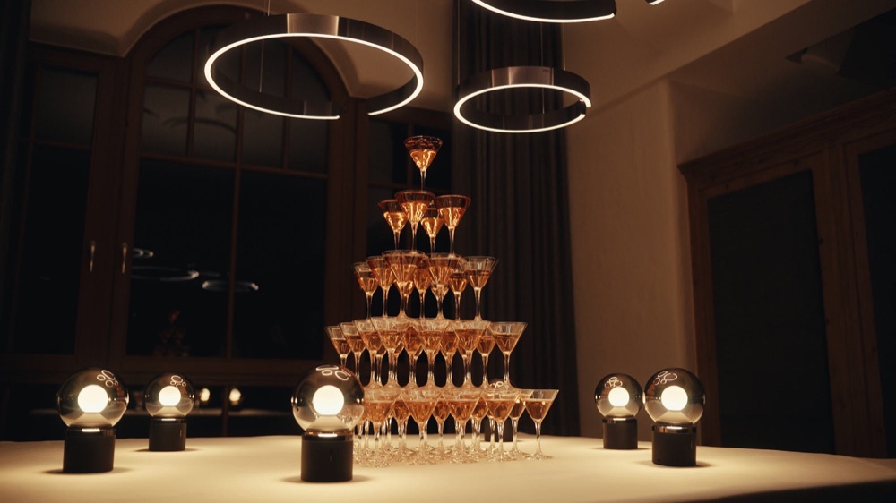 Champagne tower at the Krallerhof surrounded by Occhio Luna Pura lamps
