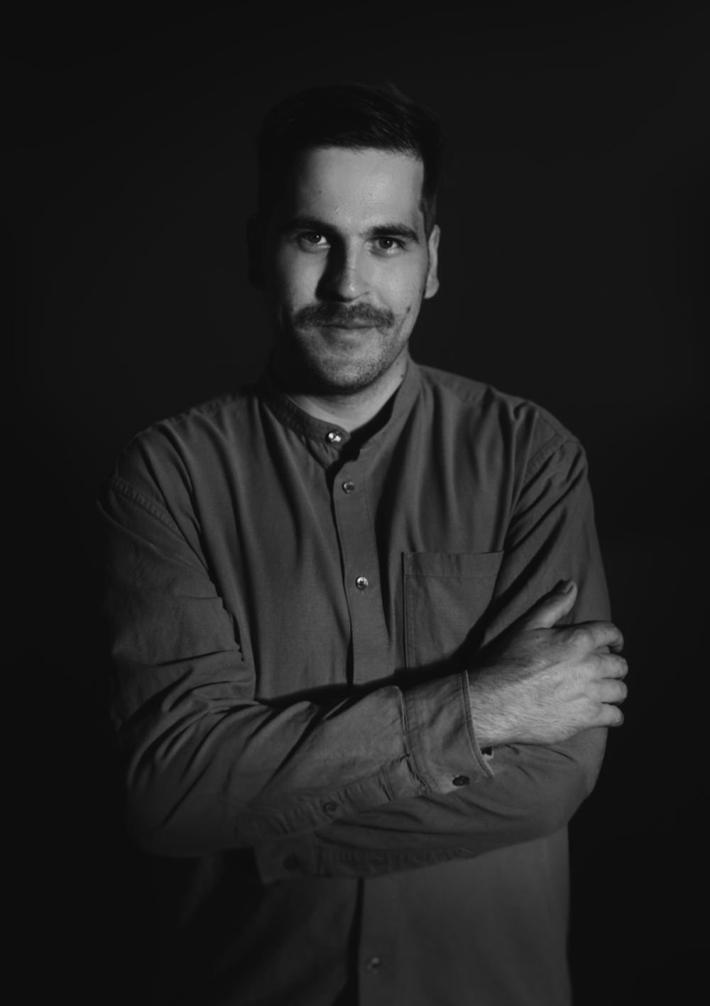 Black-and-white portrait of Konrad Milan